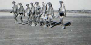 Going for a swim in the Med with helmets and rifles